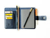 A6 size navy blue leather journal cover by Eng Leather Co. with smooth texture and stitched edges for a stylish, protective cover.