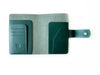 A6 leather journal cover in Northern Green by Eng Leather Co., featuring a smooth leather exterior and secure closure.