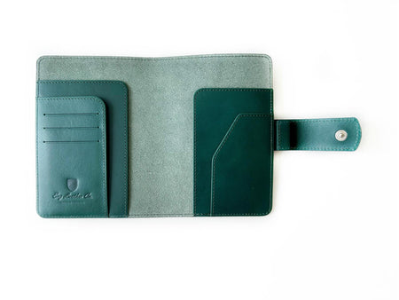A6 leather journal cover in Northern Green by Eng Leather Co., featuring a smooth leather exterior and secure closure.