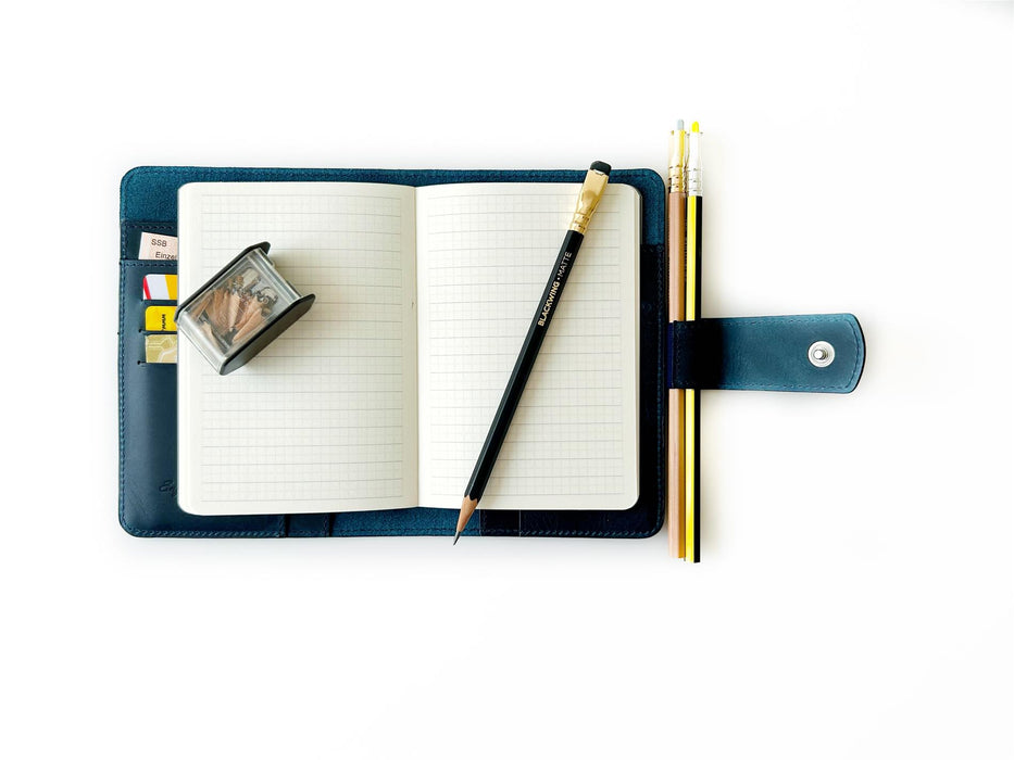 Eng Leather Co. A6 leather journal cover in ocean blue, showcasing a sleek, durable design for protecting notebooks.