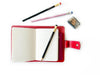 A6 leather journal cover in ruby red by Eng Leather Co., featuring a sleek and stylish design for protecting your notebook.