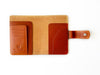 A6 leather journal cover in vibrant sunrise orange from Eng Leather Co., featuring smooth leather and secure binding.