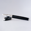 Black Grifos Cocodrie fountain pen with alligator leather finish, showcasing elegant design and fine craftsmanship.