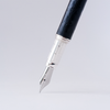 Black alligator leather fountain pen from Grifos X Papier Plume, featuring sleek black design and elegant craftsmanship.