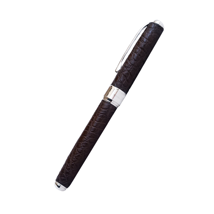 Brown Grifos Cocodrie fountain pen with alligator leather texture and gold accents, showcasing its elegant design.