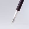 Brown Grifos Cocodrie fountain pen with alligator leather accents, stylish and elegant writing instrument.
