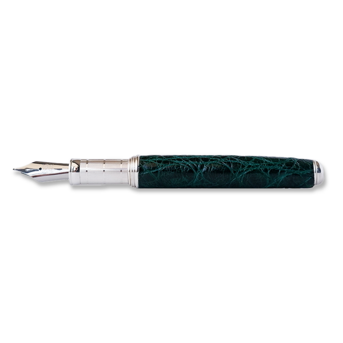 Green Grifos Papier Plume Cocodrie fountain pen with alligator leather grip and gold accents on a white background.
