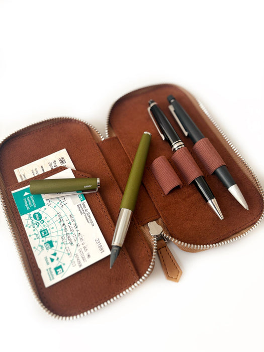 Vegan camel leather Eng Leather Co. 3-slot pen case with sleek design and secure slots for organizing writing pens.