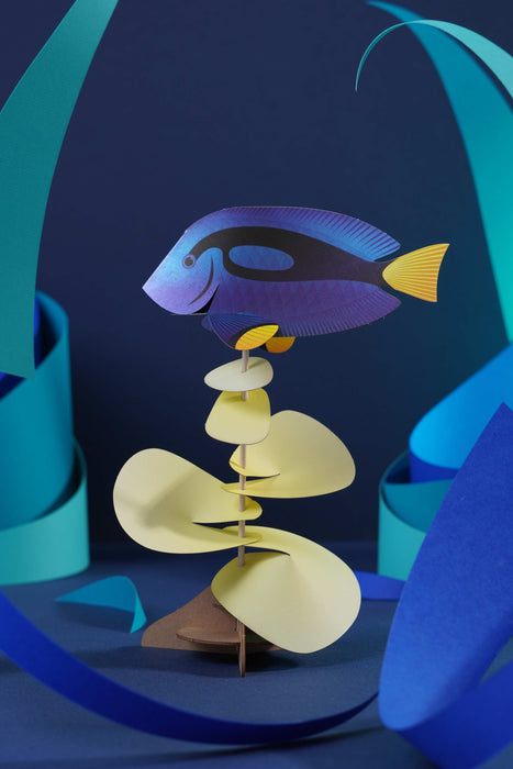 Blue Tang paper craft by Assembli, showcasing a colorful, detailed paper model of a Blue Tang fish with vibrant blue and yellow tones.