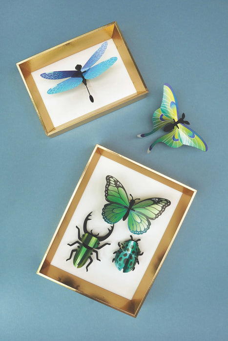Colorful paper mixed insects set by Assembli, displayed in a frame, perfect for craft projects and creative decoration.
