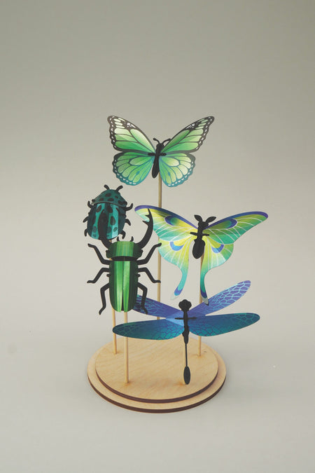 Assembli DIY crafts set with colorful pieces displayed on a stand for creative assembly and project building.
