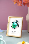 Crafts paper sea turtle baby by Assembli, featuring detailed blue and green sea turtle design for children's arts and crafts.