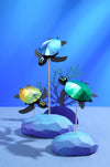Assembli Paper Sea Turtle baby craft set with three colorful paper sea turtle figures for creative crafting and decoration.