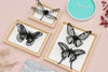 Natural wooden craft frame with black butterflies design by Assembli, showcasing detailed craftsmanship and natural wood finish.