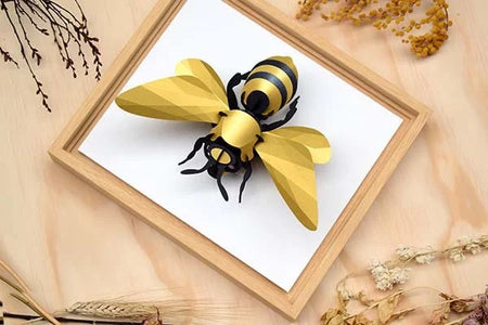 Assembli Paper Giant Honey Bee craft with colorful paper pieces and assembled wings, perfect for creative DIY projects.