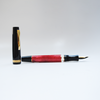 Gioia Rossa red fountain pen with gold trim, sleek design and smooth ink flow, ideal for writing and calligraphy.