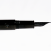 Nahvalur Nautilus fountain pen with black Cephalopod design, showcasing the elegant pen body and gold accents.