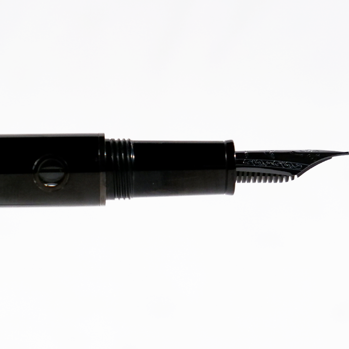 Nahvalur Nautilus fountain pen with black Cephalopod design, showcasing the elegant pen body and gold accents.