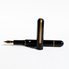 Nahvalur Nautilus bronze fountain pen with intricate Corydoras fish design on the barrel, showcasing elegant craftsmanship and detailing.