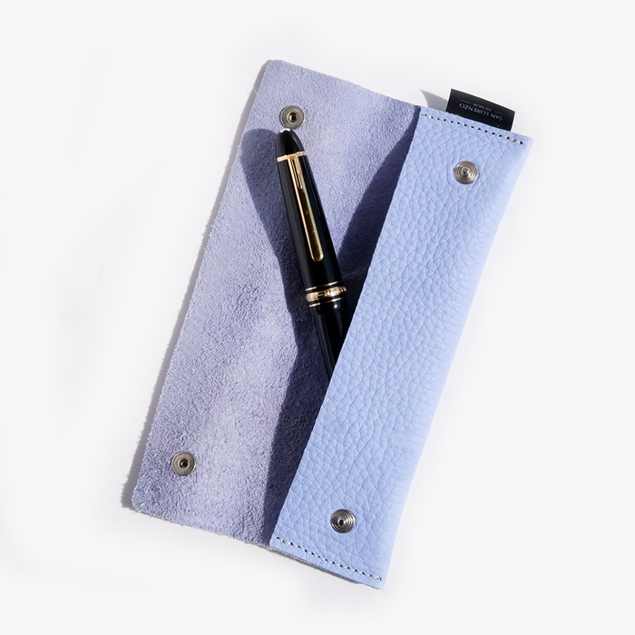 Long blue San Lorenzo pen case with zipper closure, designed to hold pens and stationery in a sleek, compact style.