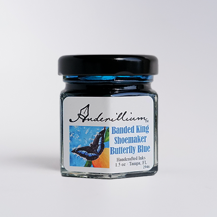 Anderillium Banded King Shoemaker Butterfly Blue fountain pen ink bottle with a blue and black banded design.