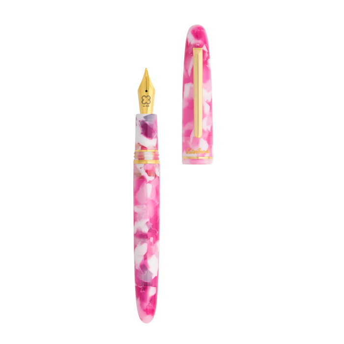 Open Esterbrook Estie Bestie fountain pen with a pink resin body and gold accents, showcasing its elegant design and craftsmanship.