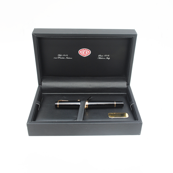 Aurora Optima black fountain pen with gold trim, elegant writing instrument with sleek design and premium craftsmanship.