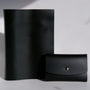 Papier Plume Swatch Book set with black cover, displaying color samples and pages for painting or design projects.