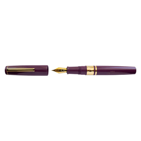 Esterbrook Model J purple fountain pen with open nib, part of the Blackberry collection, showcasing elegant design and craftsmanship.