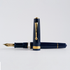 Armando Simoni Club Bologna Portofino Bespoke 2024 fountain pen in Blu Mare with gold accents, shown with its elegant design and cap.