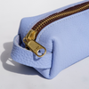 Blue San Lorenzo pen case with smooth fabric exterior and zipper closure, designed to hold pens and small stationery items.