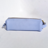 Blue San Lorenzo pen case with zipper closure, shown open with pens inside, made of durable material for everyday use.