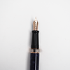 Aurora Optima Violet Auroraloide fountain pen with rose gold trim, featuring a sleek blue body and elegant design.