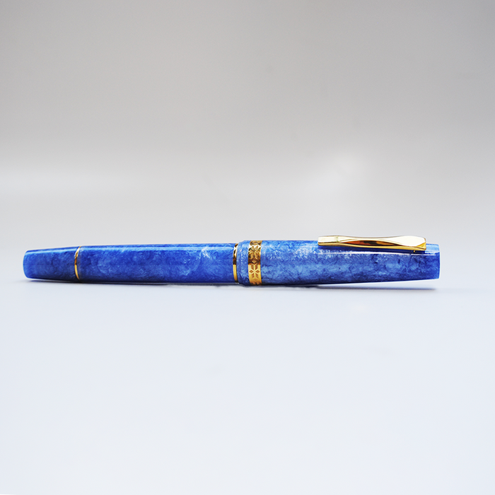 Gioia Metis 2.0 Blue Sky fountain pen with a sleek blue ink barrel and polished silver accents.