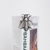 Le Potier D'Etain Fishhook Bookmark featuring intricate metalwork and a fishhook design, ideal for marking pages in books.