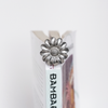 Le Potier D'Etain fishhook bookmark with a delicate flower design, ideal for marking pages in books with elegant style.