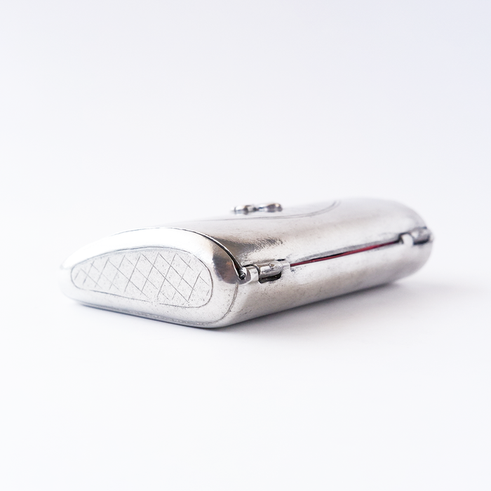 Le Potier D'etain card holder featuring elegant metal craftsmanship and a classic design for secure card storage.