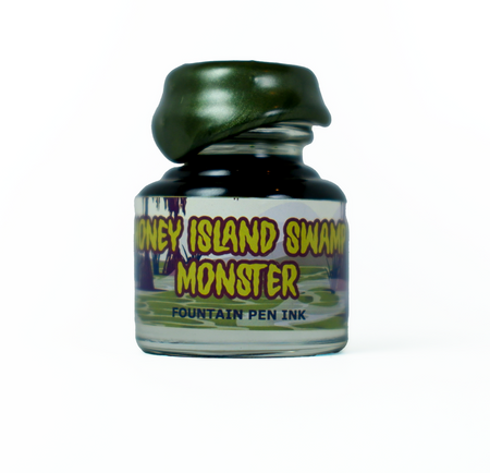 Papier Plume Honey Island Swamp Monster fountain pen ink bottle, limited edition, with dark, mossy green and swamp-inspired colors.