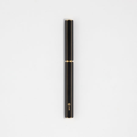 Y Studio Classic Revolve black rollerball pen with sleek design and polished brass finish, ideal for writing and office use