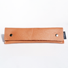 Long brown San Lorenzo pen case with a sleek, smooth exterior and secure zipper closure.