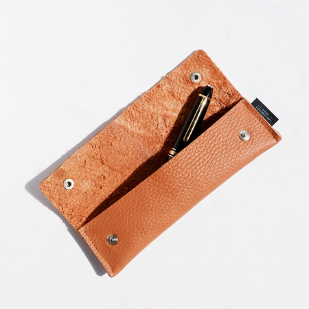 Long brown San Lorenzo pen case with a smooth leather finish, designed to hold multiple pens securely.