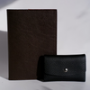 Papier Plume Swatch Book set featuring textured brown pages with color samples and swatches for design and color matching.