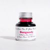 Papier Plume Burgundy fountain pen ink in a bottle, rich burgundy color, ideal for writing and calligraphy.
