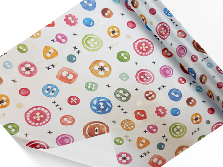 Rossi wrapping paper featuring a pattern of colorful buttons, perfect for gift wrapping and decorative packaging.