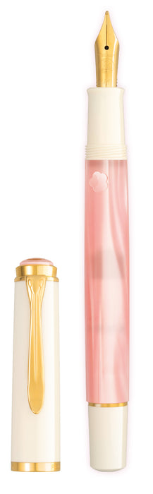 Pelikan M200 Cherry Blossom fountain pen with pink and gold accents, showcasing its elegant design and smooth ink nib.