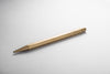 Y Studio STAT-14 Classic brass mechanical sketching pencil with a sleek design and textured grip.