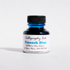 Bottle of Papier Plume calligraphy ink in Peacock Blue with a glass container and vibrant blue ink inside.