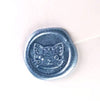 Brass wax seal stamp featuring a detailed cat face design, used for sealing documents or adding decorative touches.