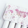 Cathay Snowlit Bloom pen case featuring a floral design with soft pastel colors and a sleek, compact shape for storing writing instruments.