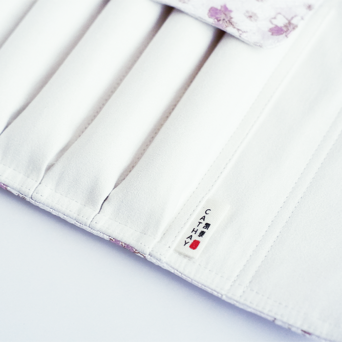 Cathay Snowlit Bloom pen case featuring floral design, compact storage for writing instruments, made of durable material.